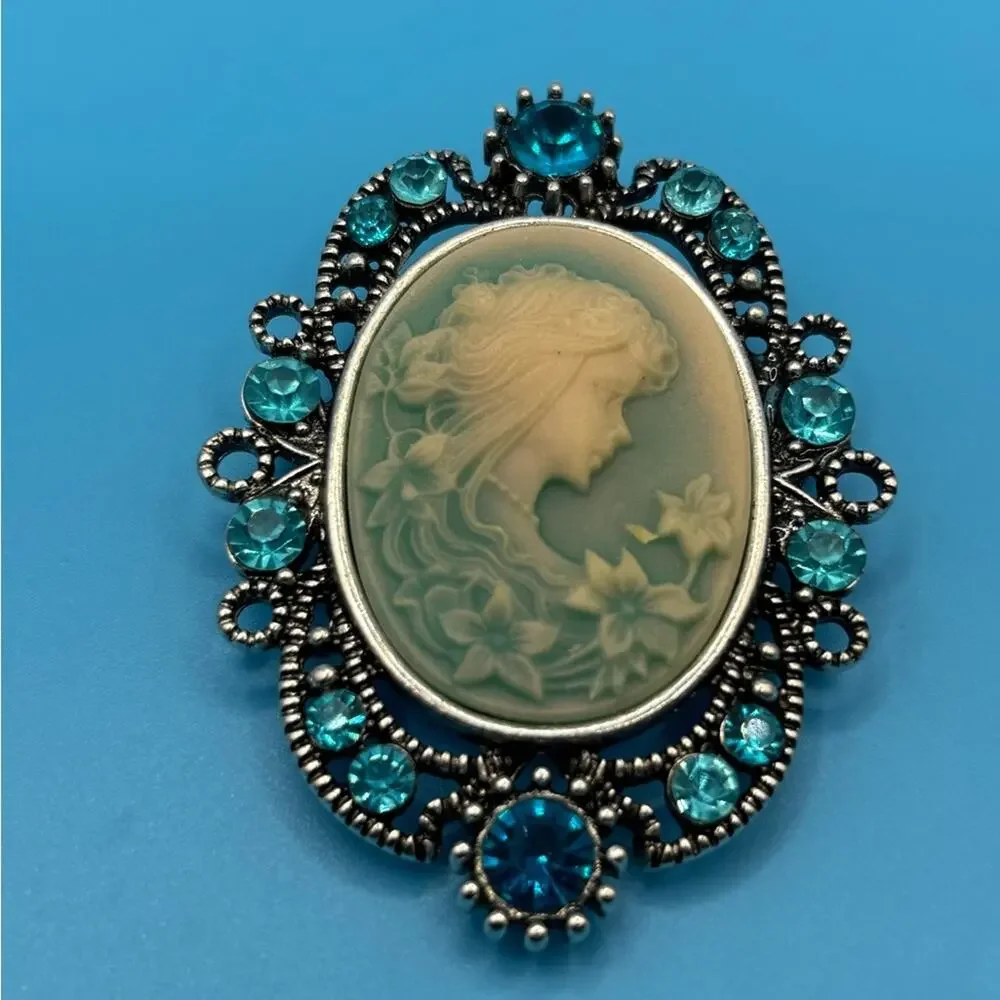 Elegant Blue Cameo with‎ Silver Tone Filigree and Blue Rhinestones Brooch
